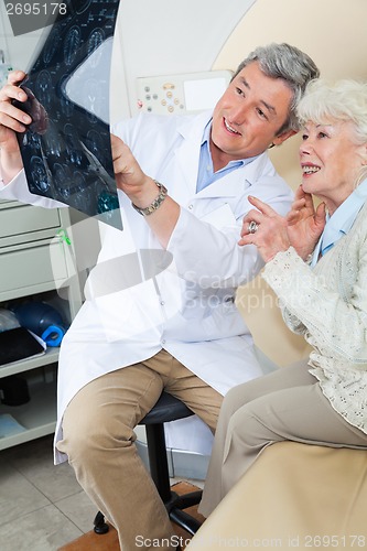 Image of Radiologist Explaining X-ray To Patient