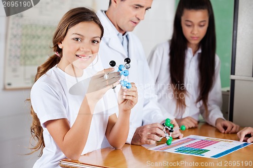 Image of Teenage Schoolgirl With Molecular Structure