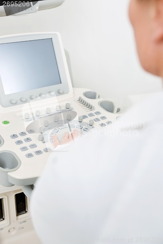 Image of Female Doctor Using Ultrasound Machine