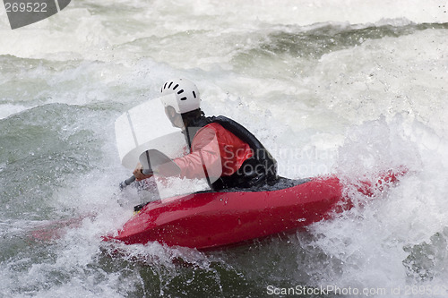 Image of Red kayak in action