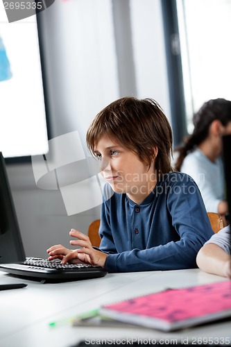 Image of Schoolboy Using Desktop Pc In Computer Lab