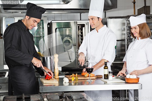 Image of Chefs Working In Commercial Kitchen