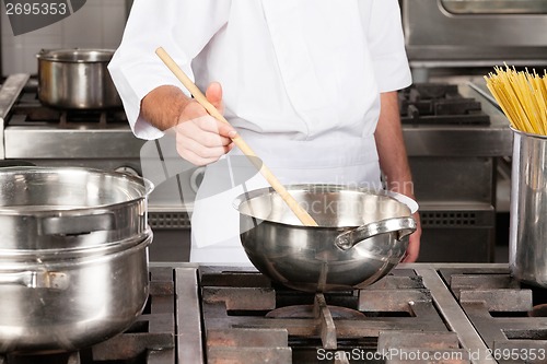 Image of Male Chef Preparing Food