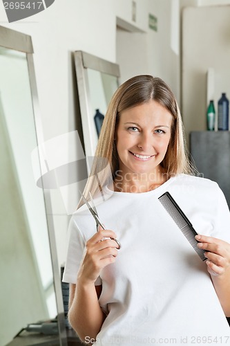 Image of Hairdresser With Scissors And Comb