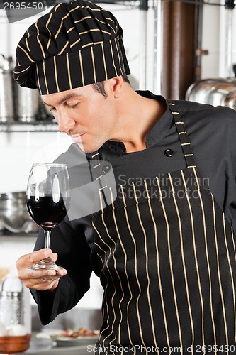 Image of Chef Smelling Red Wine