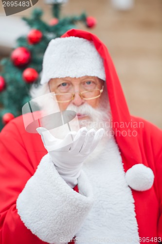 Image of Santa Claus Blowing Kiss