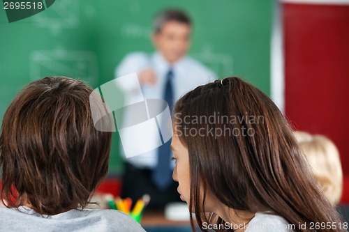 Image of Closeup Of Little Boy And Girl In Classroom