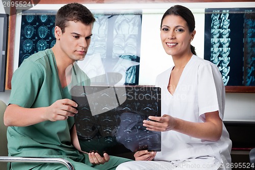 Image of Medical Technicians Analyzing MRI X-ray