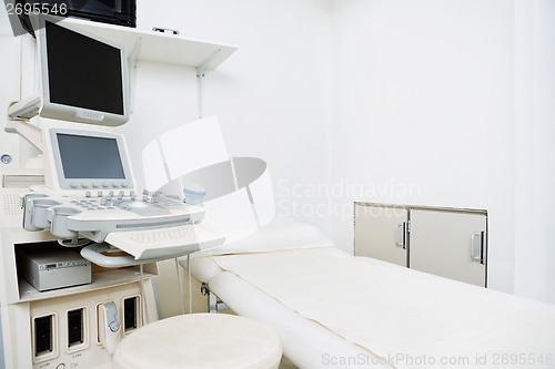 Image of Clinic With Ultrasound Machine And Bed