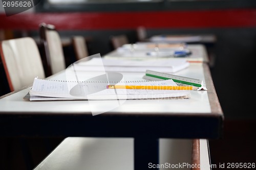 Image of Books And Pencil On Desk