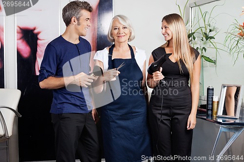 Image of Hairstylists With Scissors