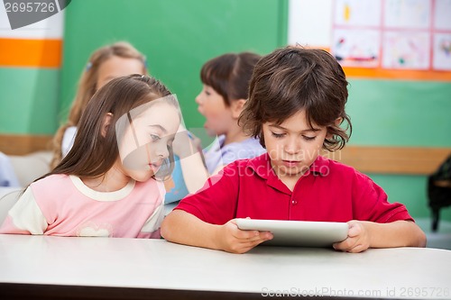 Image of Children Using Digital Tablet At Preschool