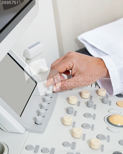 Image of Radiologist Operating Ultrasound Machine