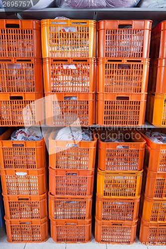 Image of Laundry Baskets In Shelves