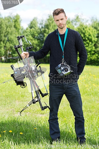 Image of Engineer With UAV Drone And Remote Control