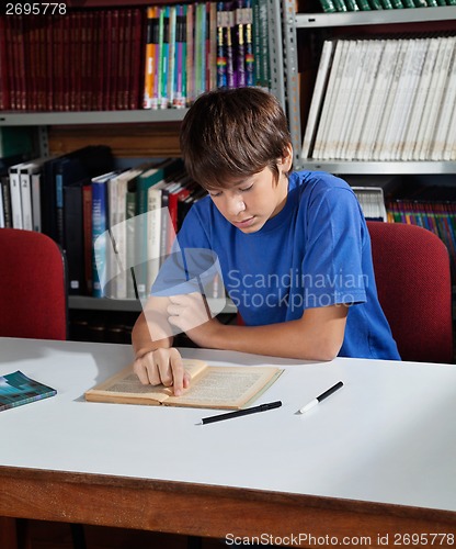 Image of High School Student Studying In Library