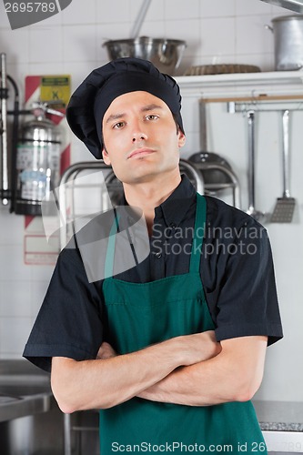 Image of Serious Male Chef With Arms Folded