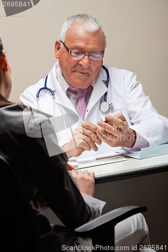 Image of Doctor Going Through Medicine Box