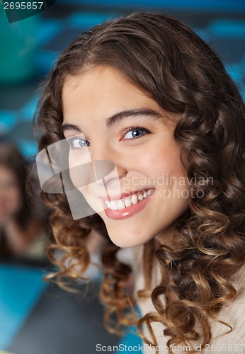 Image of Beautiful Teacher Smiling In Classroom