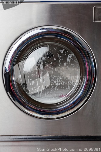 Image of Washing Machine With Foam On Front Load