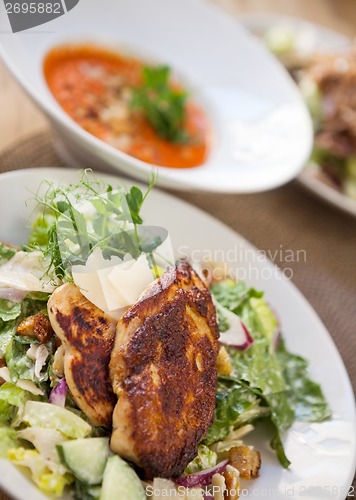 Image of Roasted Chicken Salad In Plate With Dish In Background