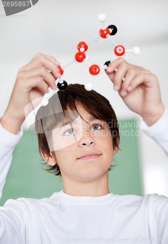 Image of High School Student Looking At Molecular Structure