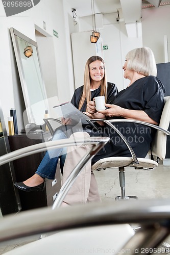 Image of Female Customers Waiting In Hair Salon