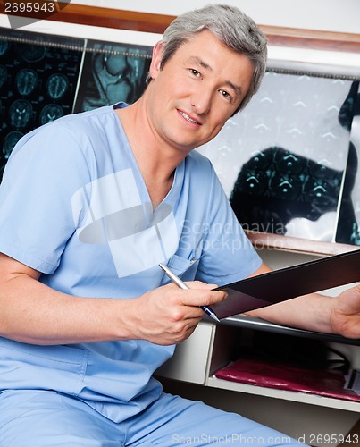 Image of Medical Professional Holding Clipboard