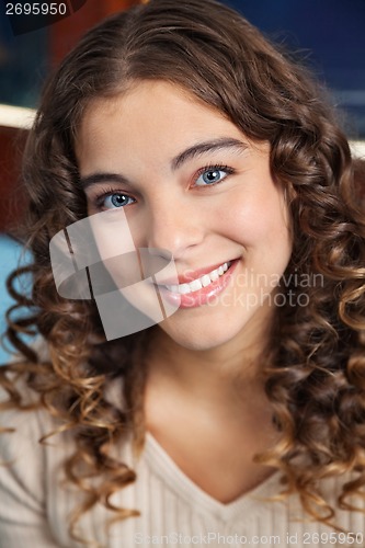 Image of Young Teacher Smiling In Kindergarten