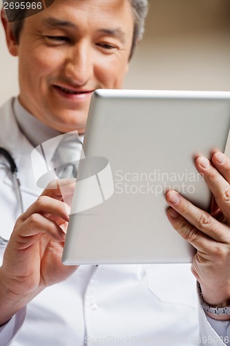 Image of Doctor Using Digital Tablet