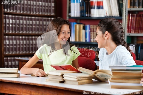 Image of Schoolgirls Looking At Each Other