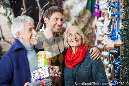 Image of Family Shopping In Christmas Store