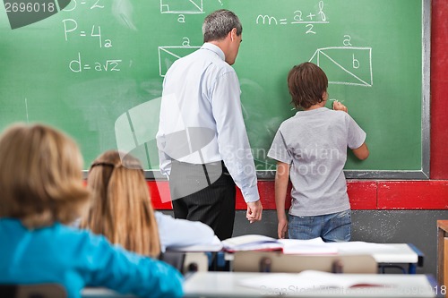 Image of Schoolboy Solving Mathematics