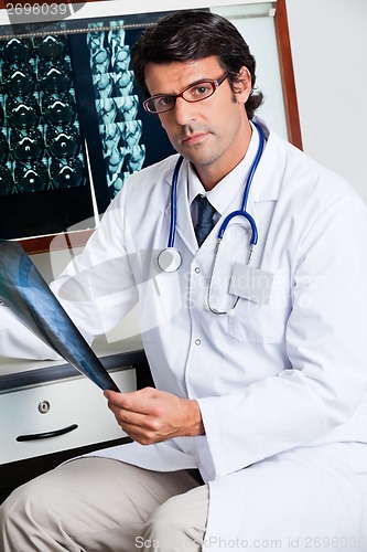 Image of Radiologist Holding X-ray