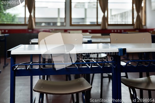 Image of Classroom With Empty Chairs And Desks