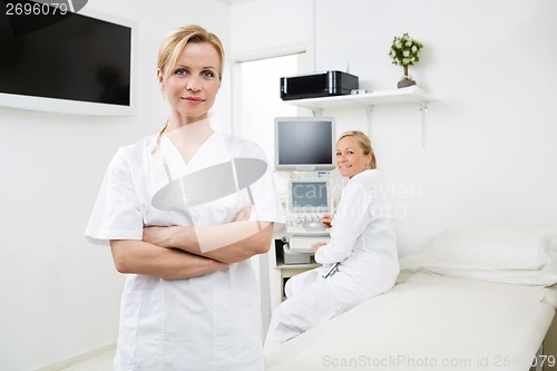 Image of Confident Gynecologists In Examination Room