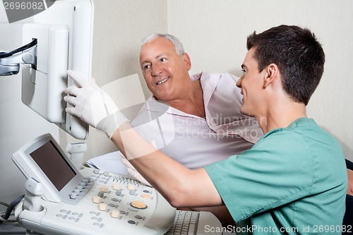 Image of Patient Looking At Ultrasound Machine