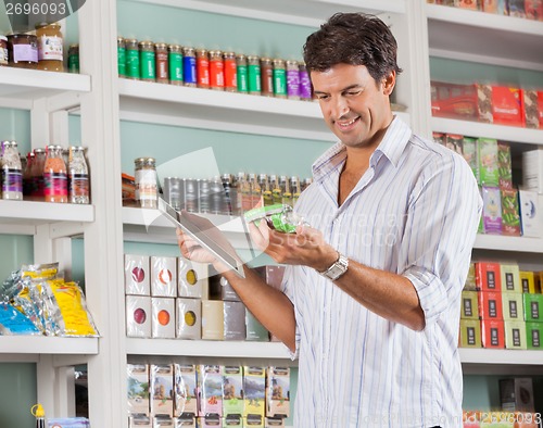 Image of Man Looking At Product