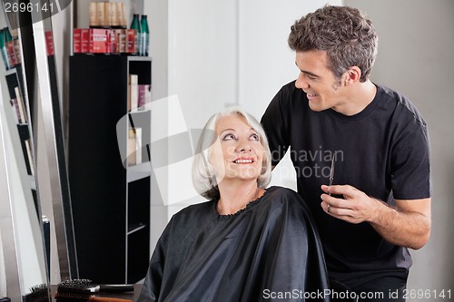 Image of Female Client And Hairdresser Looking At Each Other