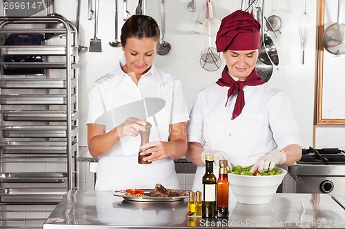 Image of Female Chefs Preparing Food