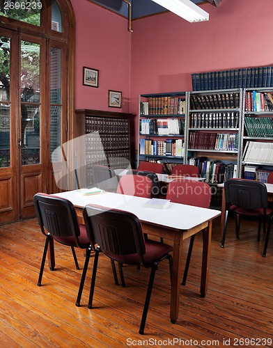 Image of Empty Library With Tables And Chairs