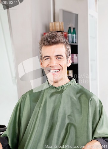 Image of Customer Wearing Apron In Hair Salon