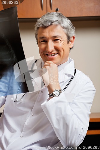 Image of Happy Radiologist With X-ray