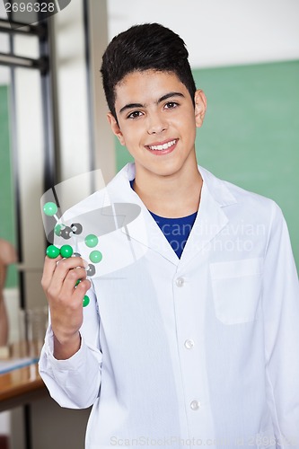 Image of Male Student Holding Molecular Structure In Lab