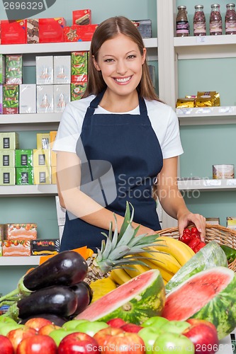 Image of Happy Saleswoman Working At Supermarket