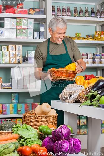 Image of Salesman Working In Grocery Store