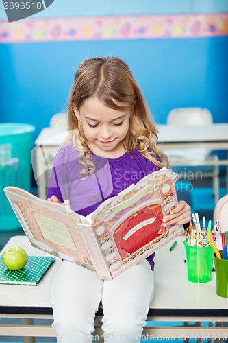 Image of Girl Reading Book