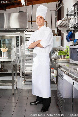 Image of Confident Male Chef In Kitchen