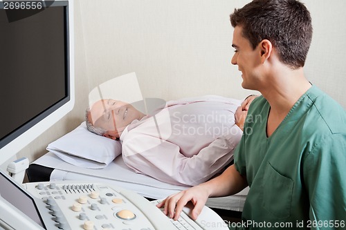 Image of Technician Smiling At Patient