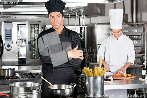 Image of Confident Chef With Colleague In Kitchen